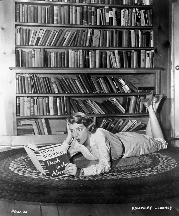Framed Print : Rosemary Clooney Reading a Book Framed Print : Rosemary Clooney Reading a Book