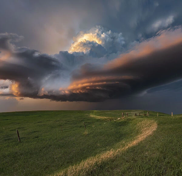 A rotating mesocyclone storm over South Dakota at sunset. USA