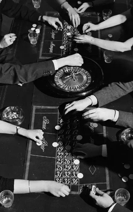 Framed Print : Roulette. People placing their bets on a roulette table Framed Print : Roulette. People placing their bets on a roulette table