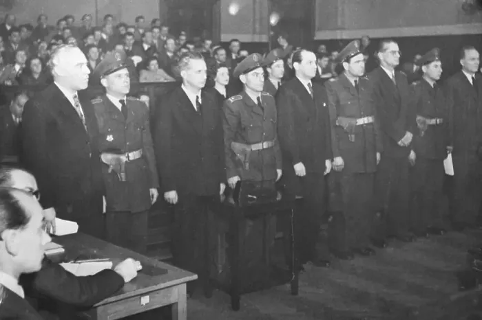 Framed Print : Row Of Accused Standing In Courtroom Framed Print : Row Of Accused Standing In Courtroom