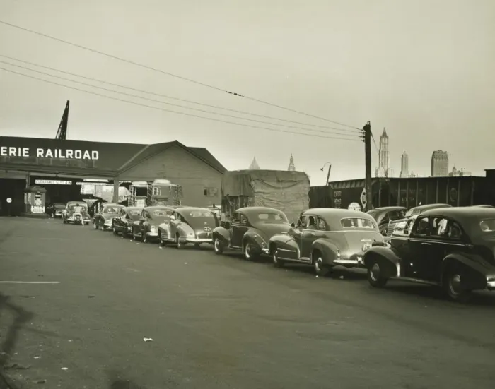 Framed Print : Row of cars in front of railway station, (B&W) Framed Print : Row of cars in front of railway station, (B&W)
