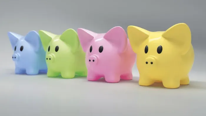 Framed Print : A row of colorful piggy banks Framed Print : A row of colorful piggy banks
