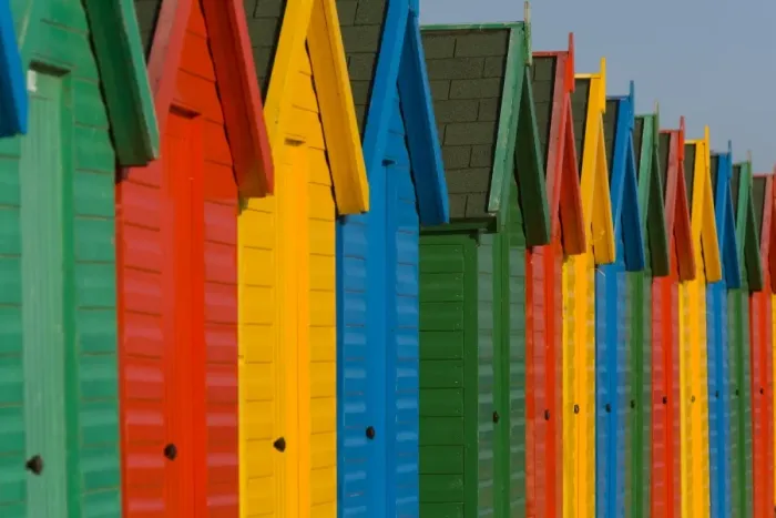 Framed Print : Row of multi-coloured beach huts Framed Print : Row of multi-coloured beach huts
