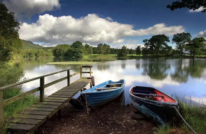 Framed Print : Two rowing boats tied to wooden pier Framed Print : Two rowing boats tied to wooden pier