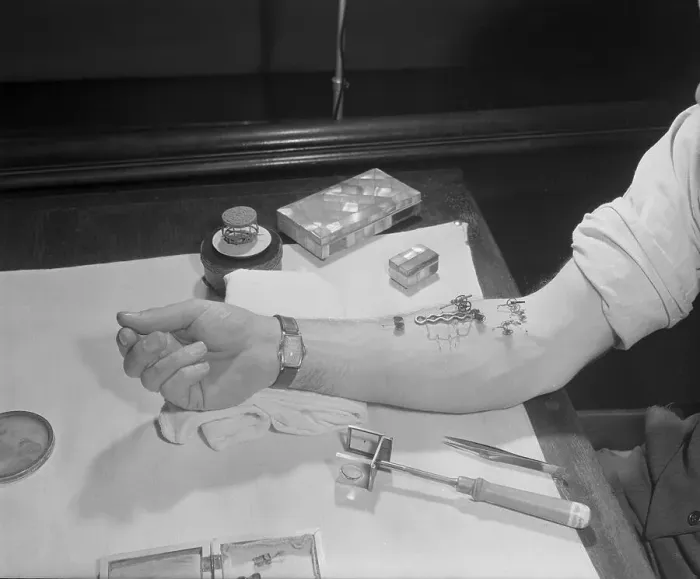 Framed Print : Roy Heckler Feeding Flea Circus on His Arm Framed Print : Roy Heckler Feeding Flea Circus on His Arm