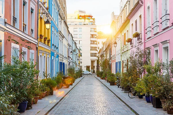 Rue Cremieux multicolored street during sunrise without people in Paris, France