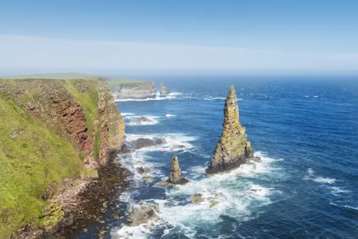 Framed Print : Rugged coastal landscape with the Duncansby Stacks, rock pinnacles, at Duncansby Head, Caithness, Scotland, United Kingdom, Europe