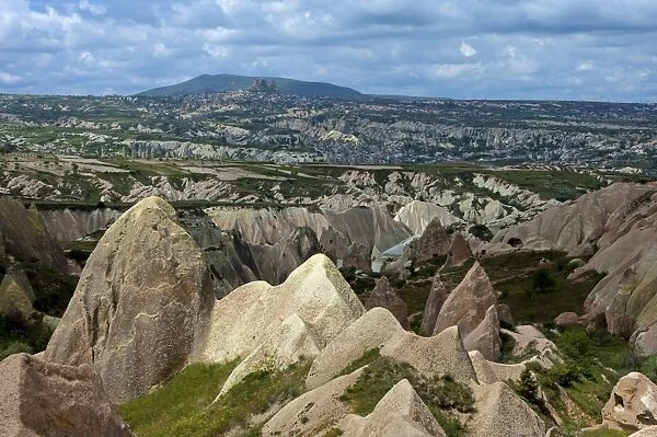 Rugged landscape with weathered tuff formations, Rose Valley, Goreme National Park, Cappadocia, Nevsehir Province, Central Anatolia Region, Turkey