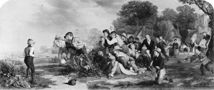 Framed Print : No Rules. A group of boys playing an old-fashioned version of football Framed Print : No Rules. A group of boys playing an old-fashioned version of football