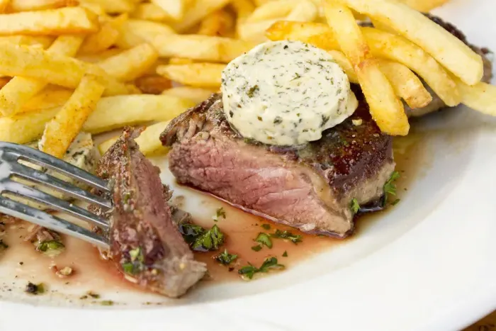 Framed Print : Rump steak, medium, with French fries and herb butter Framed Print : Rump steak, medium, with French fries and herb butter