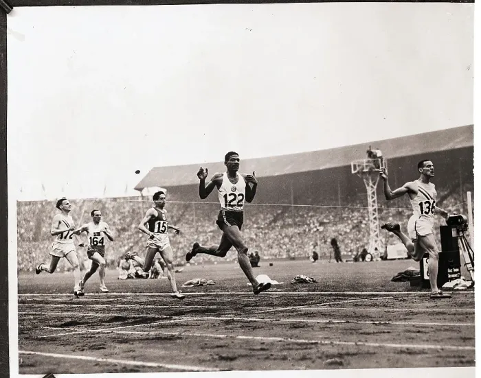 Framed Print : Runners Cross Finish Line at Olympics Framed Print : Runners Cross Finish Line at Olympics