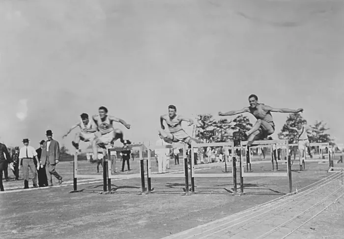 Framed Print : Runners Jumping High Hurdles Framed Print : Runners Jumping High Hurdles