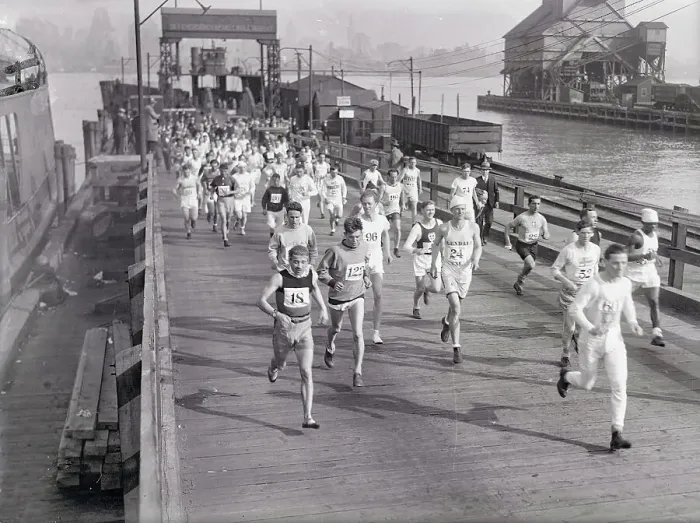 Framed Print : Runners Laving Ferry on Jersey Side While Participating in Cross Country Race