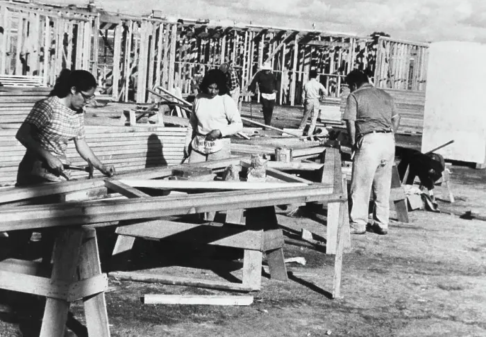 Framed Print : Rural Families Work Together to Build Homes Framed Print : Rural Families Work Together to Build Homes