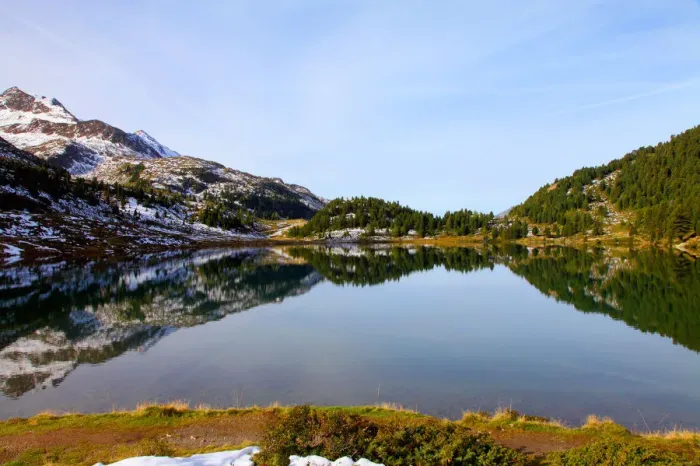 Framed Print : Rural landscape reflected in still lake Framed Print : Rural landscape reflected in still lake