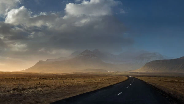 Rural road through Iceland landscape