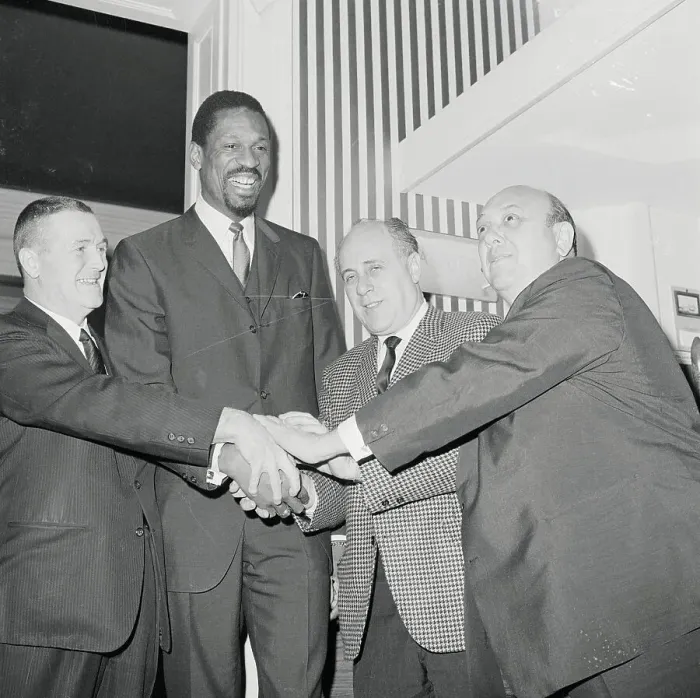 Framed Print : Bill Russell Joining Hands with Officials Framed Print : Bill Russell Joining Hands with Officials