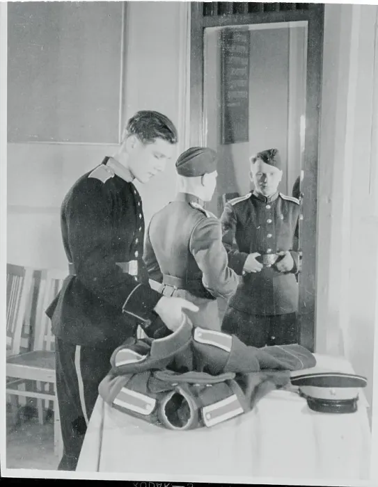 Framed Print : Russian Teenager Trying on Uniform Framed Print : Russian Teenager Trying on Uniform