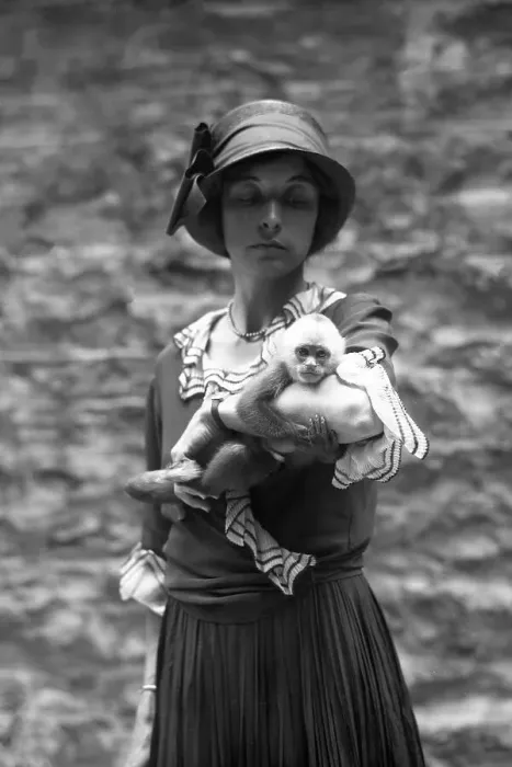 Framed Print : Ruth Rose Holding A White Faced Cebus Monkey Framed Print : Ruth Rose Holding A White Faced Cebus Monkey