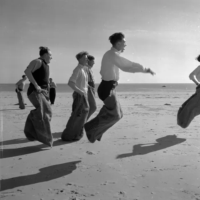 Framed Print : Sack Race. 25th April 1953: Newly wed couples honeymooning in Jersey enjoy Framed Print : Sack Race. 25th April 1953: Newly wed couples honeymooning in Jersey enjoy