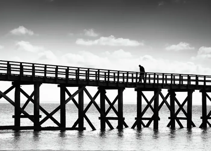 Framed Print : Sad or pensive man walking on a pontoon, France Framed Print : Sad or pensive man walking on a pontoon, France