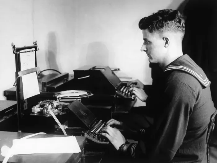 Framed Print : Sailor Sits Typing Out Message At Sea Framed Print : Sailor Sits Typing Out Message At Sea