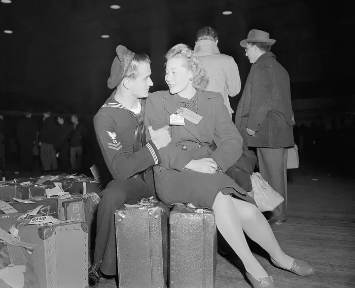 Framed Print : Sailor And Wife Seated On Luggage Framed Print : Sailor And Wife Seated On Luggage