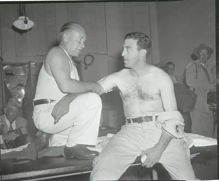 Framed Print : Sal Maglie Receiving Massage from His Trainer