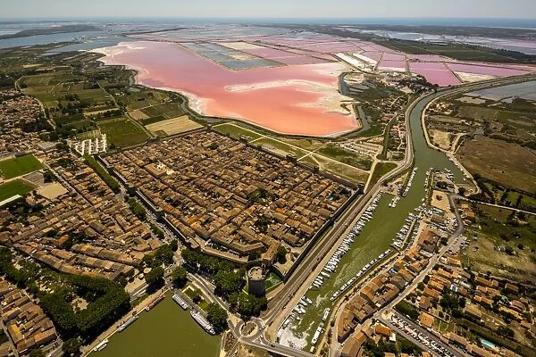 Salines and the historic centre in the quadrilateral of Aigues-Mortes, Camargue, Languedoc-Roussillon, France