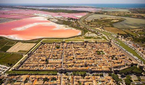 Salines and the historic centre in the quadrilateral of Aigues-Mortes, Camargue, Languedoc-Roussillon, France