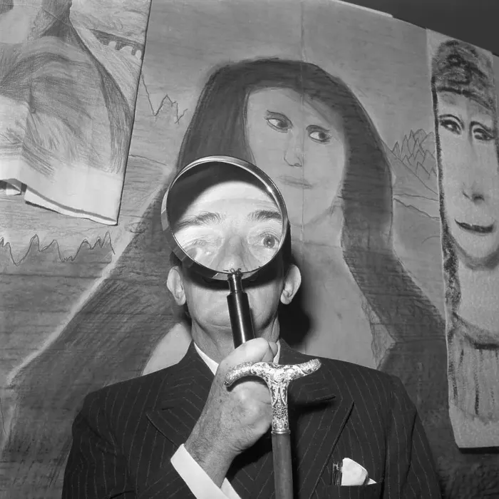 Framed Print : Salvador Dali Looking Through a Magnifying Glass with Amateur Mona Lisa's Framed Print : Salvador Dali Looking Through a Magnifying Glass with Amateur Mona Lisa's
