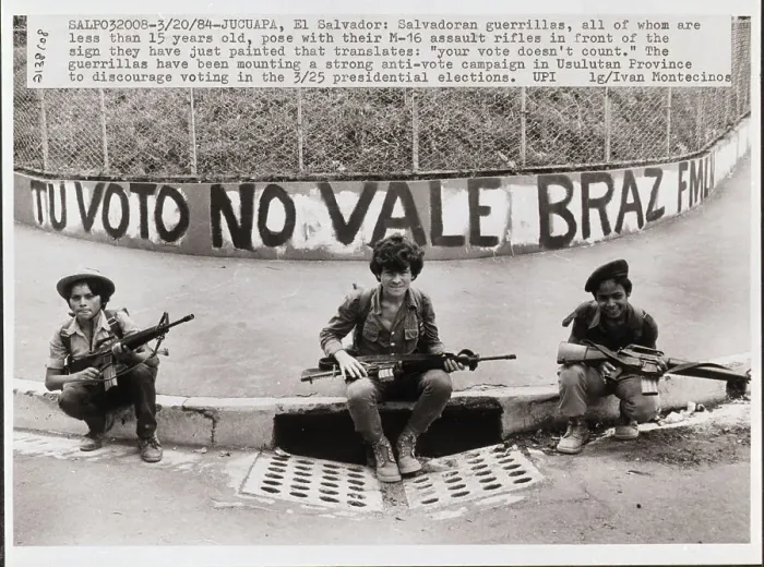 Framed Print : Salvadorean Guerrillas Pose with Anti-Vote Banner Framed Print : Salvadorean Guerrillas Pose with Anti-Vote Banner