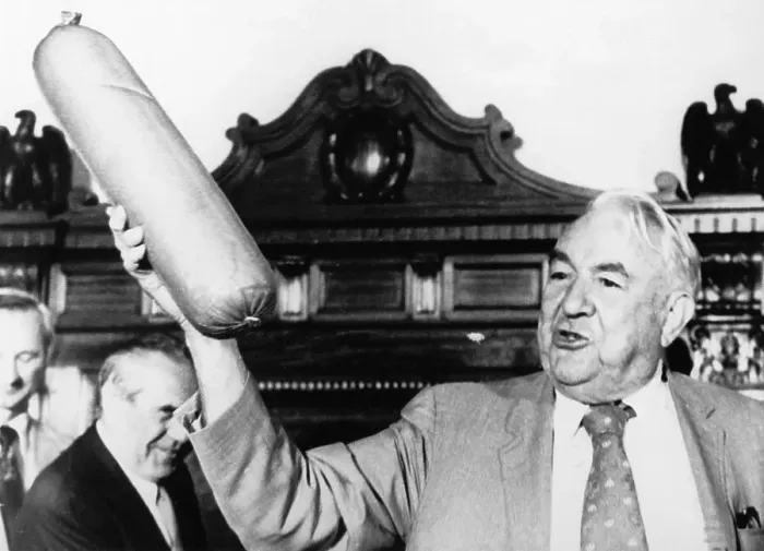 Framed Print : Sam Ervin Holding Up Bologna at Watergate Hearing Framed Print : Sam Ervin Holding Up Bologna at Watergate Hearing
