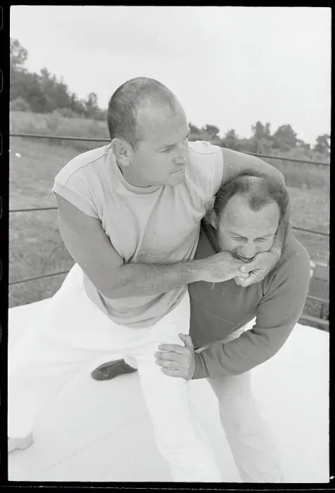 Framed Print : Sam Sheppard Putting Headlock on His Trainer Framed Print : Sam Sheppard Putting Headlock on His Trainer
