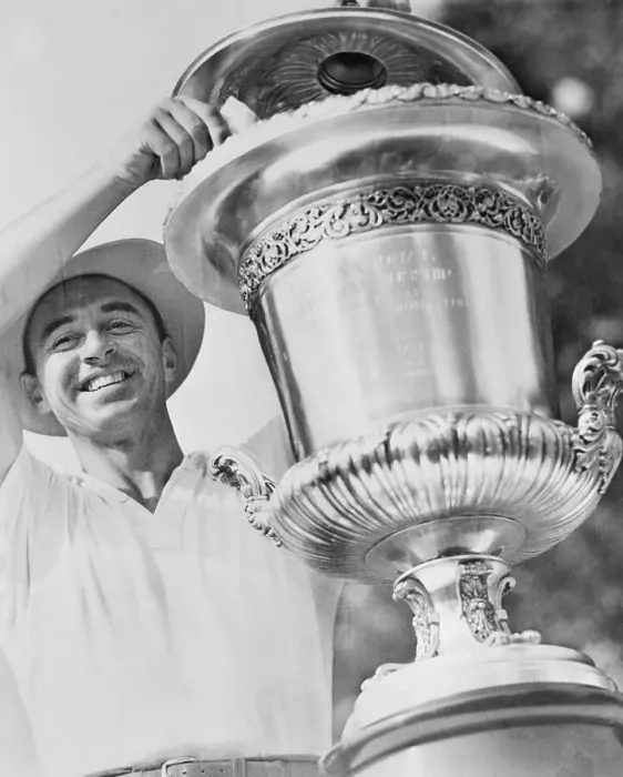 Framed Print : Sam Snead Putting Prize Check into Trophy Framed Print : Sam Snead Putting Prize Check into Trophy