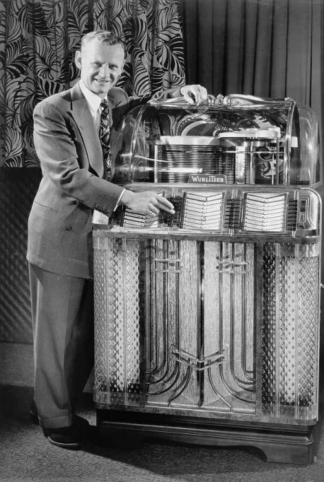 Framed Print : Sammy Kaye Posing with a Wurlitzer Jukebox Framed Print : Sammy Kaye Posing with a Wurlitzer Jukebox