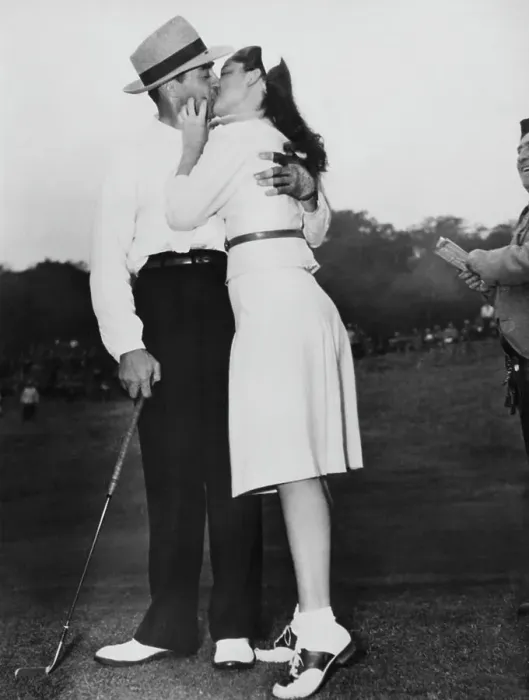 Framed Print : Sammy Snead and Golf Open Hostess Kissing on the Green Framed Print : Sammy Snead and Golf Open Hostess Kissing on the Green