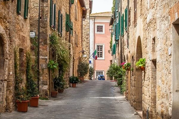 San Quirico d Orcia. Scenic narrow street of small medieval town of San Quirico