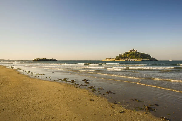 Sand beach with the island of St. Michaels Mount at high tide, Marazion, Cornwall, England, United Kingdom