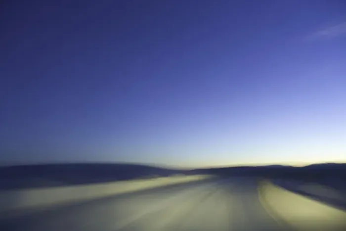 Framed Print : Sand road through dunes, lit by headlights, night (blurred motion)