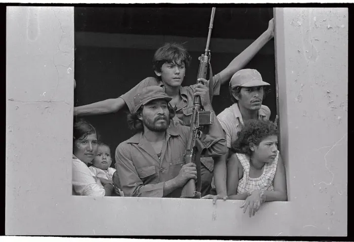 Framed Print : Sandinista Soldier with Family Holding Gun Framed Print : Sandinista Soldier with Family Holding Gun