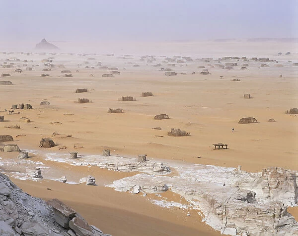 Sandstorm. Sand filled air, Tubu nomad huts, Ounianga Serir, Chad