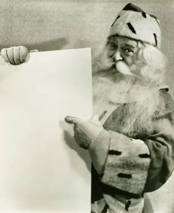 Framed Print : Santa Claus holding blank sheet of paper, (B&W), portrait Framed Print : Santa Claus holding blank sheet of paper, (B&W), portrait