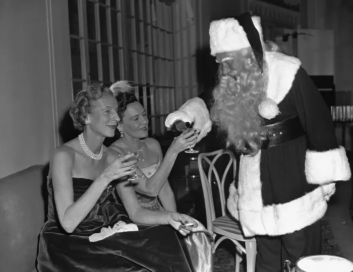 Framed Print : Santa Claus Pours Champagne for Women Framed Print : Santa Claus Pours Champagne for Women