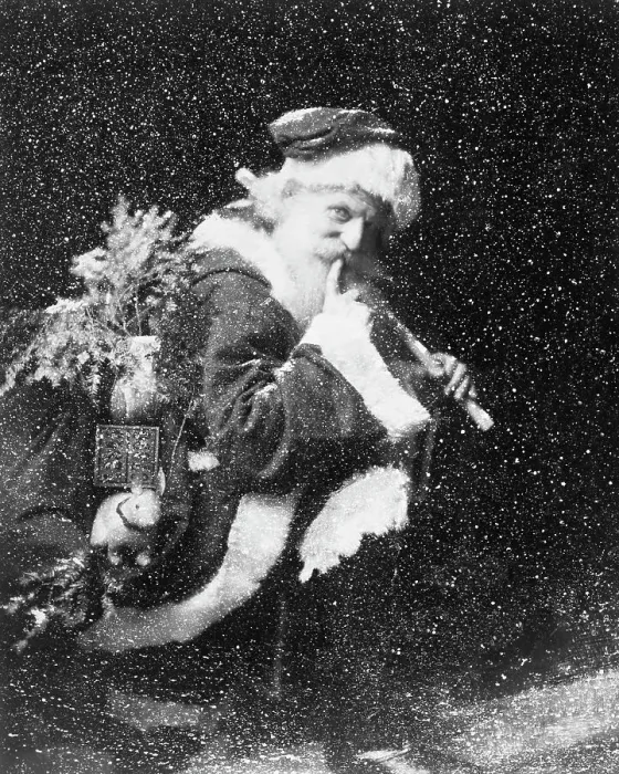 Framed Print : Santa Claus Saying Shh! on a Rooftop
