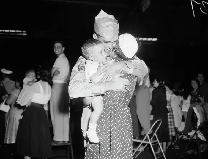 Framed Print : Sargeant Is Greeted By Wife And Son