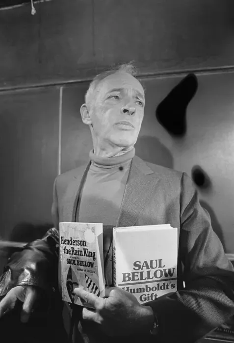 Framed Print : Saul Bellow Displaying Two Novels Framed Print : Saul Bellow Displaying Two Novels