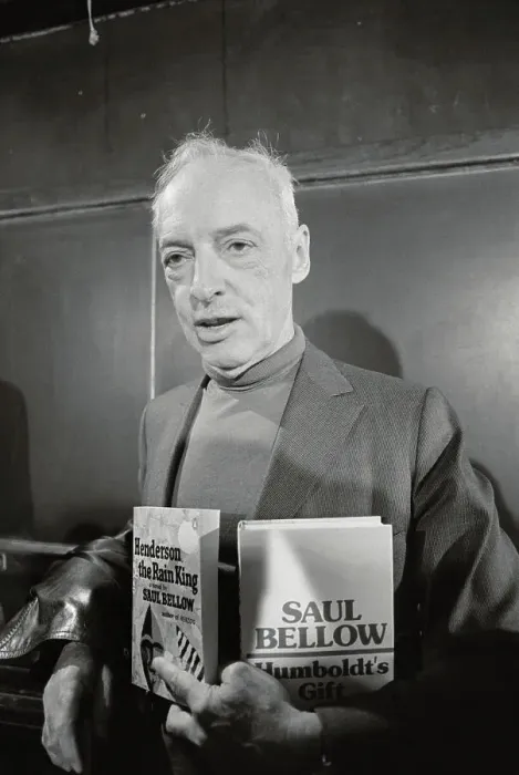 Framed Print : Saul Bellow Displaying Two Novels Framed Print : Saul Bellow Displaying Two Novels