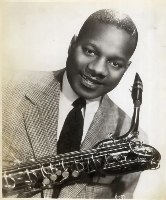 Framed Print : Saxophonist Holding Saxophone Framed Print : Saxophonist Holding Saxophone