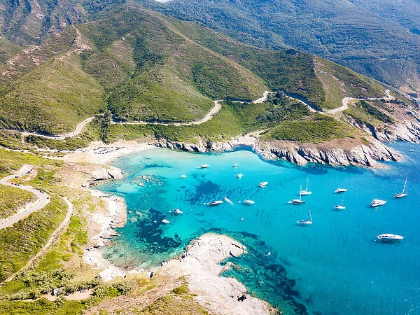 Scenic seascape and road near Anse d Aliso, Corsica, France